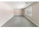 Empty living room with plenty of natural light from the window at 3884 Rockey Valley Dr, Conley, GA 30288