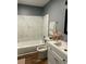 Bathroom with a marble tiled shower and white vanity at 5824 Par Four Ct # 5824, Lithonia, GA 30038