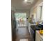Well-lit kitchen with stainless steel appliances and a view of the backyard at 5824 Par Four Ct # 5824, Lithonia, GA 30038