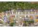 Aerial view of a residential neighborhood street lined with mature trees and well-kept lawns at 11853 Harbour Town Pkwy, Fayetteville, GA 30215