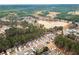 Residential area featuring mature trees, a nearby body of water, and common amenities at 11853 Harbour Town Pkwy, Fayetteville, GA 30215