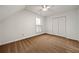 Comfortable bedroom showcasing neutral carpeting, a closet, and a bright window at 11853 Harbour Town Pkwy, Fayetteville, GA 30215
