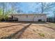 Spacious backyard with a small deck, perfect for outdoor entertaining and enjoying the fresh air at 1433 Dennis Dr, Decatur, GA 30032