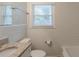 Bathroom featuring tiled walls, a sink with granite countertops, and a bathtub at 1925 Campbellton Sw Rd, Atlanta, GA 30311