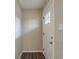 Bright entryway with hardwood flooring and a white front door at 1925 Campbellton Sw Rd, Atlanta, GA 30311