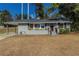 Charming single-story home with gray brick, carport, and well-maintained front lawn at 1925 Campbellton Sw Rd, Atlanta, GA 30311