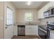 Well-equipped kitchen featuring stainless steel appliances and granite countertops at 1925 Campbellton Sw Rd, Atlanta, GA 30311