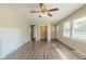 Inviting living room featuring hardwood floors and a decorative fireplace at 1925 Campbellton Sw Rd, Atlanta, GA 30311