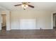 Spacious living room showcasing hardwood floors and a whitewashed fireplace at 1925 Campbellton Sw Rd, Atlanta, GA 30311