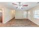 Open-concept living room showcasing laminate floors and a view of the kitchen at 3192 Belfort Se Rd, Atlanta, GA 30354