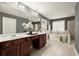 Bathroom with double vanity, modern fixtures and a freestanding tub and glass shower at 3680 Falling Leaf Ln, Cumming, GA 30041