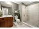 Bathroom features updated tile in the shower, modern fixtures, and fresh paint at 3680 Falling Leaf Ln, Cumming, GA 30041