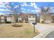 Beautiful two-story home with stone accents, two-car garage, and a well-maintained lawn in a suburban neighborhood at 3680 Falling Leaf Ln, Cumming, GA 30041