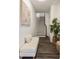 Bright foyer with a bench, hardwood floors, and staircase leading to the upper level at 754 Aerial Way, Atlanta, GA 30312
