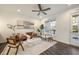 Bright living room featuring hardwood floors, modern furniture and contemporary artwork at 754 Aerial Way, Atlanta, GA 30312