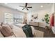 Bright main bedroom with large window, wood-look floors and modern décor at 754 Aerial Way, Atlanta, GA 30312