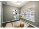 Home office with hardwood floors, a glass desk, and bright natural light at 754 Aerial Way, Atlanta, GA 30312