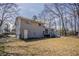 Large backyard with a deck and stairs, offering a great outdoor living space at 810 N Carter Dr, Jonesboro, GA 30236