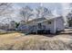Expansive backyard featuring a deck with stairs, perfect for outdoor entertaining at 810 N Carter Dr, Jonesboro, GA 30236