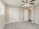 Charming bedroom shows fresh carpet and paint, plus a bright window at 810 N Carter Dr, Jonesboro, GA 30236