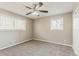 Bright bedroom features new carpet, fresh paint, ceiling fan and ample natural light at 810 N Carter Dr, Jonesboro, GA 30236