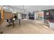 Large finished basement offering a flexible living space with carpet and access to other rooms at 135 Newcastle Ct, Roswell, GA 30076