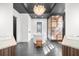 Modern bathroom features freestanding tub, glass shower, dark ceiling, and stone tile floor at 135 Newcastle Ct, Roswell, GA 30076