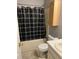 Bathroom with vanity, toilet and bathtub with shower at 232 Rockingham Dr, Loganville, GA 30052