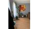 Living room featuring stylish decor, houseplants, and a vibrant floral painting, adding a touch of nature at 232 Rockingham Dr, Loganville, GA 30052