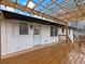Cozy outdoor deck with pergola, offering a seamless transition to the backyard at 2308 Mark Trl, Decatur, GA 30032