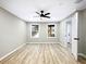 This bedroom features wood floors, fresh paint, and an abundance of natural light at 2308 Mark Trl, Decatur, GA 30032