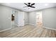 A clean, bright bedroom with wide plank floors and fresh paint is ready for furniture and move-in at 2308 Mark Trl, Decatur, GA 30032