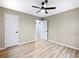 Spacious bedroom featuring two closets and wood look flooring at 2308 Mark Trl, Decatur, GA 30032