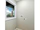 Convenient laundry hookups with a window for natural light at 2308 Mark Trl, Decatur, GA 30032