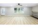 Open living room with a large window, providing an abundance of natural light at 2308 Mark Trl, Decatur, GA 30032