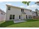 A home backyard features a lawn and back entrance to the home at 4416 Water Mill Dr, Buford, GA 30519