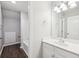Hallway bathroom with vanity, mirror, and combination shower/tub at 4416 Water Mill Dr, Buford, GA 30519