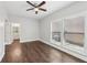 Bedroom with hardwood flooring and views of the backyard at 4416 Water Mill Dr, Buford, GA 30519