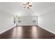 Large bedroom featuring vaulted ceiling, dark wood floors and lots of light at 4416 Water Mill Dr, Buford, GA 30519