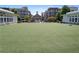 Large community green with water feature and buildings in the background at 511 Burton Dr # 805, Alpharetta, GA 30009
