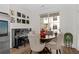 Cozy dining area with a round table, comfortable seating, and a sliding glass door to the outside at 511 Burton Dr # 805, Alpharetta, GA 30009