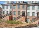 Modern townhome complex with brick and siding exteriors and black metal railings at 511 Burton Dr # 805, Alpharetta, GA 30009