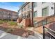 Attractive townhomes with brick and siding exteriors, landscaped yards, and inviting staircases to each front door at 511 Burton Dr # 805, Alpharetta, GA 30009