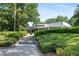 The Alpharetta Arts Center has a modern design surrounded by lush landscaping at 511 Burton Dr # 805, Alpharetta, GA 30009