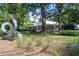 Alpharetta Arts Center is surrounded by manicured grounds with modern sculpture at 511 Burton Dr # 805, Alpharetta, GA 30009