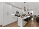 Modern kitchen featuring white cabinetry, quartz countertops, and stainless steel appliances at 511 Burton Dr # 805, Alpharetta, GA 30009