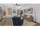 Well-lit living room with comfortable seating, a ceiling fan, and hardwood floors at 511 Burton Dr # 805, Alpharetta, GA 30009