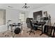 Well-lit office with drum set, professional audio equipment, guitars, sleek black desk, and a modern ceiling light fixture at 511 Burton Dr # 805, Alpharetta, GA 30009