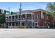 Lively restaurant exterior with outdoor seating and charming decor on a sunny day at a street corner at 511 Burton Dr # 805, Alpharetta, GA 30009