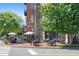 Charming restaurant patio with outdoor seating, umbrellas, and lush greenery, perfect for dining al fresco at 511 Burton Dr # 805, Alpharetta, GA 30009